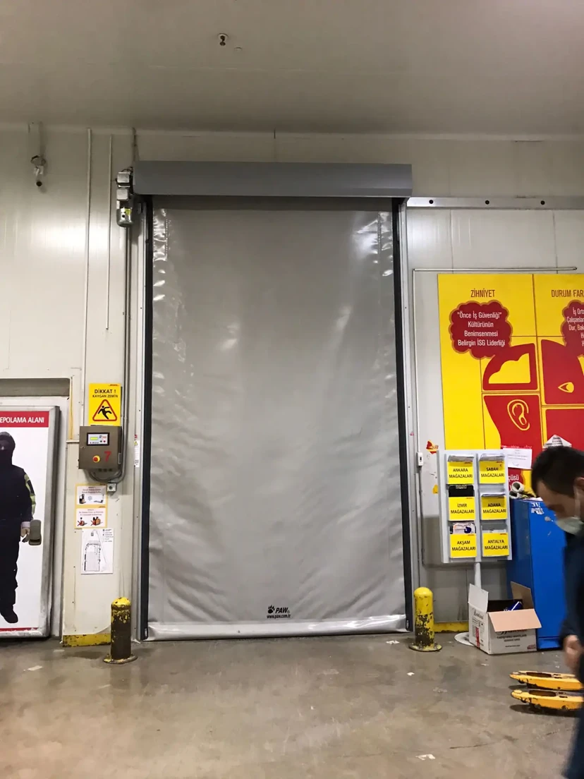 High-speed doors in a logistics warehouse
