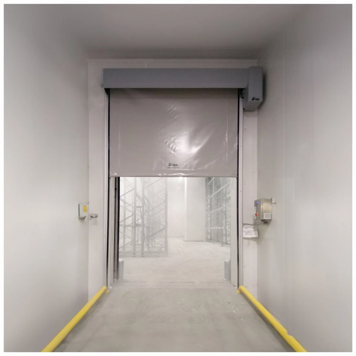 Insulated industrial doors for cold storage facility