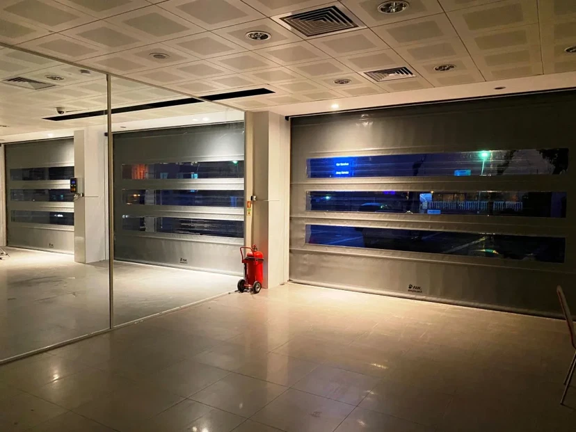 Dark Grey Windowed High-Speed PVC Door Dark grey high-speed PVC door with window panel