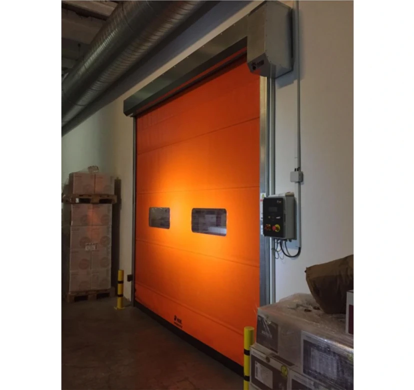 Orange Storage Room Rapid Roll-Up PVC Door Orange rapid roll-up PVC door in a storage room