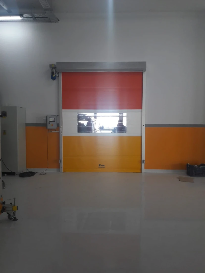 Orange Windowed Rapid Roll-Up Door Orange windowed rapid roll-up door