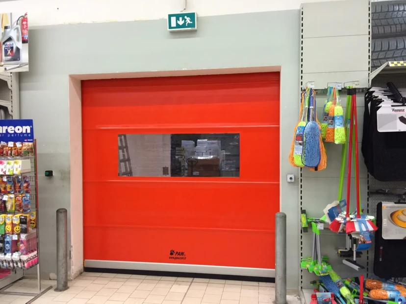 Red Windowed Roll-Up Door for Storage Area Red windowed roll-up door for a storage area