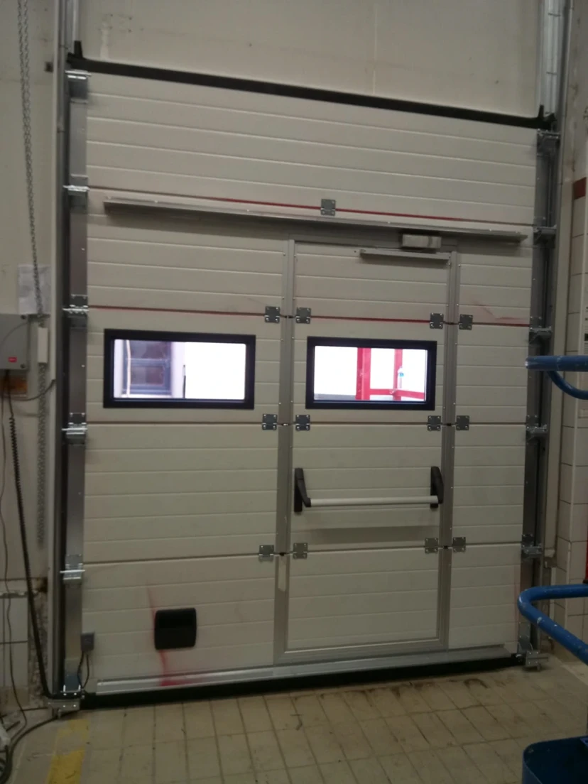 Sectional Door With Service Door Industrial sectional door with service door