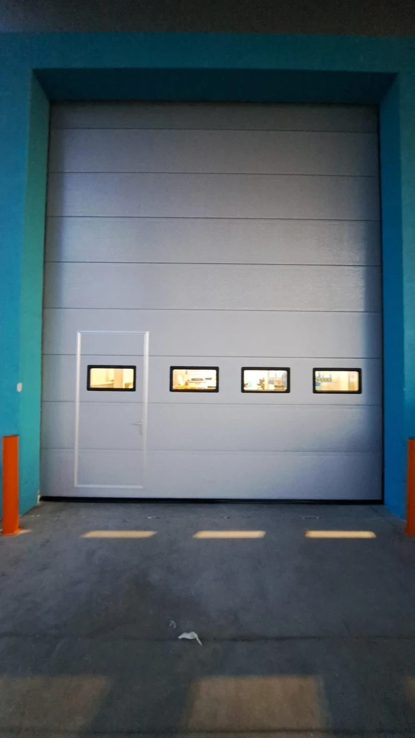 Sectional Door With Service Door & Window Sectional door with service door and window