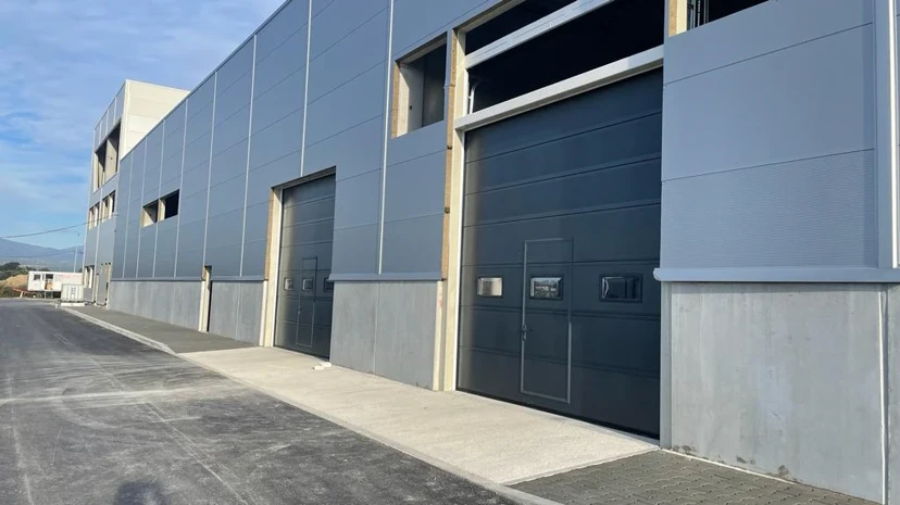 Warehouse Sectional With Service Door Warehouse sectional door with service door
